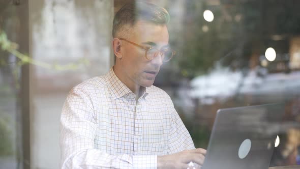 Man sitting in the coffee shop.