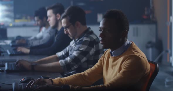 Programmers Working in a Common Office alt