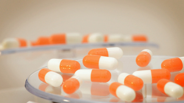 Orange Medication Capsule Rotating, Stock Footage 