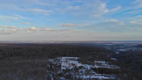 Mysterious Fantastic Winter Panoramic Landscape with Snowy Forest in Heavy Snowfall Aerial View alt