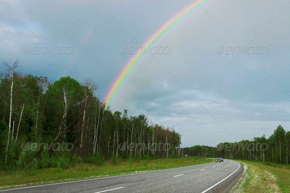 Rainbow after rain over highway
