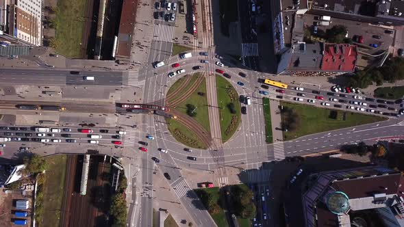Aerial View of The Bustling Traffic on The Road at the Crossroads in the Big City, Shot in 4K UHD alt