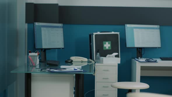 Nobody in Medical Cabinet Used By Doctor to Do Physical Examination alt