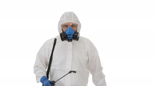 Disinfectant Walking with Antiviral Liquid Tank Looking To Camera on White Background. alt