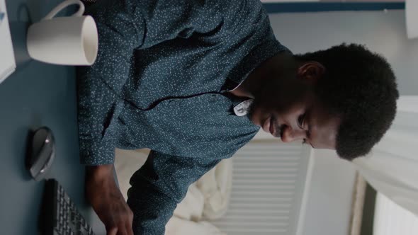 Vertical Video Authentic Smiling Black African American Man Working From Home alt