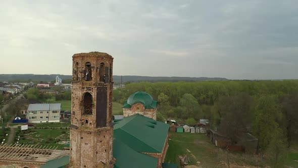 Tower of Abandoned Brick Church in Small Town