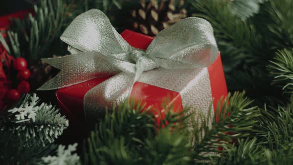 Red luxury New Year's gift with white silver ribbon alt