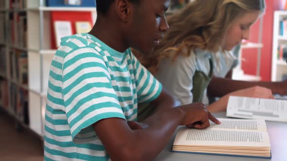Students studying in classroom alt