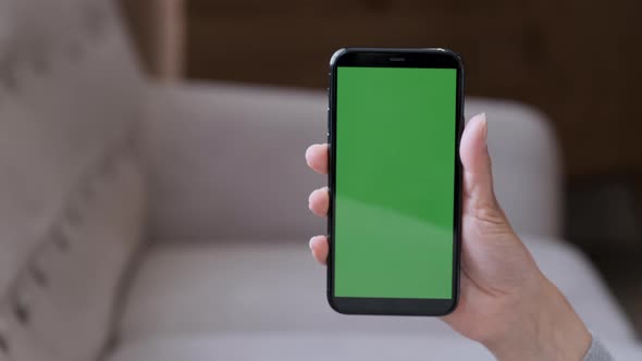 Point of View of Woman at Phone with Green Screen for Copy Space. Chromakey Mock Up alt