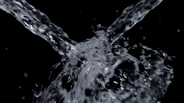 Two Jets of Flying Drinking Water Splashes with Drops Isolated on Black Slow Mo