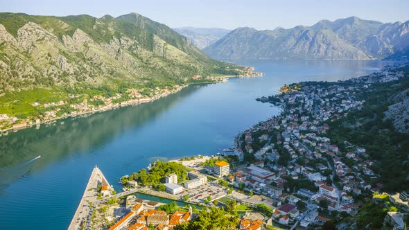 Timelapse, sunrise over the kotor bay and city, moving line of light, Montenegro