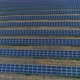 Aerial Drone Top View of Solar Panels at Energy Farm with Sunlight