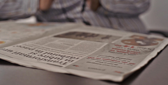 Newspapers on a Desk