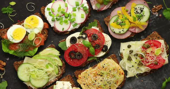 Sandwiches with Different Kinds of Toppings. Placed in Rows. Vegetable Kitchen Concept alt