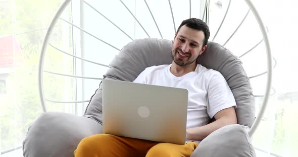 Man vlogger look at camera talk make live video conference call online chat. alt