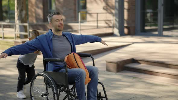 Father Having Fun with His Son After School alt