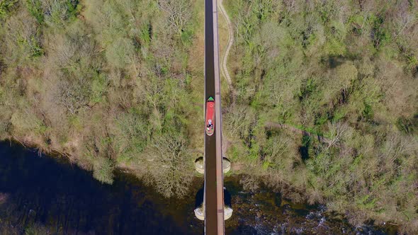 A Narrow Boat, canal boat travelling up stream on the famous Llangollen canal route towards Pontcysy alt
