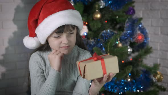 Child Unhappy Emotions with Gift alt