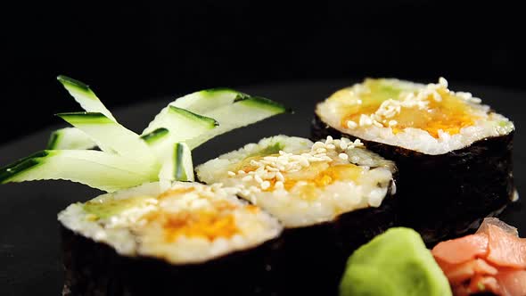 Maki sushi roll served on tray alt