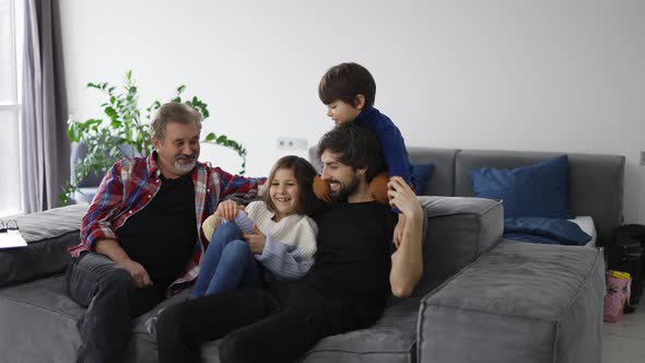 Happy Family Have Fun and Spends Time Together  Grandpa Son and Kids Slow Motion alt
