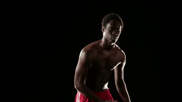 Man Play Basketball Isolated on Black alt