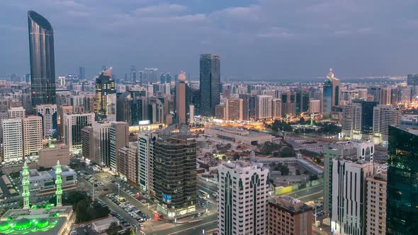 Modern City Architecture of Abu Dhabi Skyline Day to Night Timelapse UAE alt