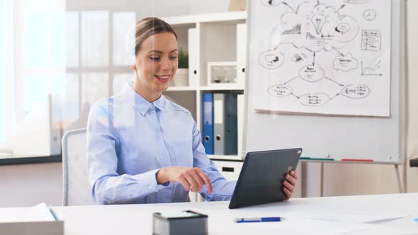Businesswoman Having Video Call on Tablet Computer 47 alt