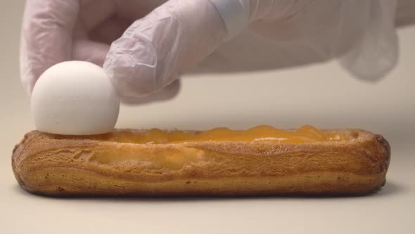 Confectioner Adds Cream Cheese Balls To the Eclair, Making Dessert with Mascarpone, Sweet Choux alt
