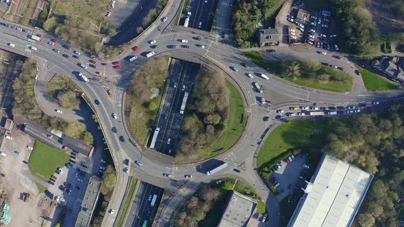 Aerial footage of a large section of commuter motorway, highway, during busy congestion, traffic, ru alt