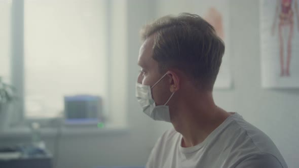 Guy Patient Waiting Vaccination Sitting Clinic Closeup alt