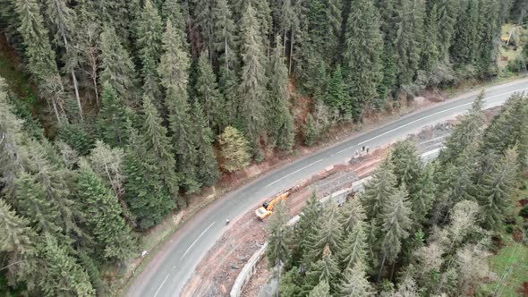 Cycling. Cyclist riding bicycle on speed highway road in mountains. Cycling travel adventures. alt