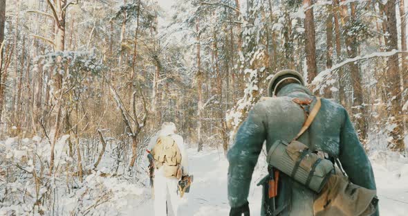 Group Of Reenactors Dressed As German Wehrmacht Infantry Soldiers In World War II Running With alt