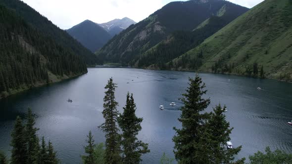 Kolsai Mountain Lake and Green Forest alt