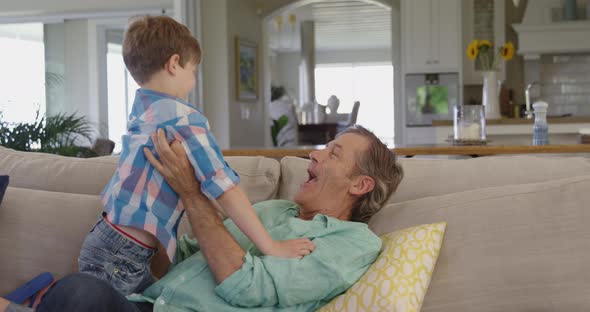 Family spending time together at home alt