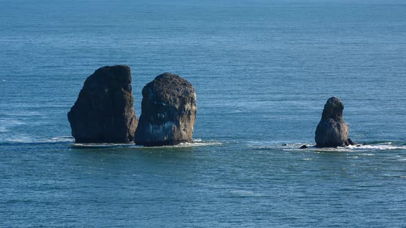 Seascape of Kamchatka Peninsula: Three Brothers Rocks in Avachinskaya Bay (Pacific Ocean)