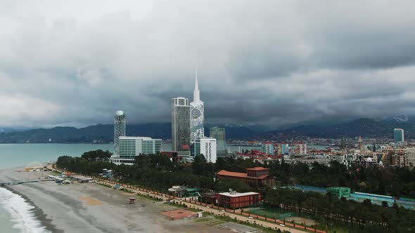 Batumi From A Bird's Eye View In The Clouds Of The Mountain In The Background