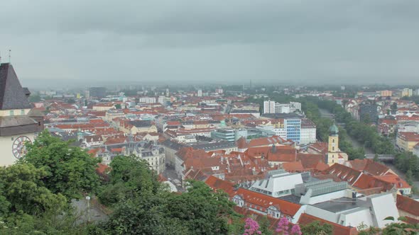 Panoramic Moving View on Austrian Graz City From Famous Schlossberg Castle Hill in Rainy Weather