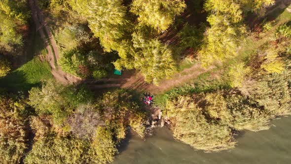Aerial Top Down Drone View of Group People Lying on Grass Like Star Friends Have Good Time Together alt