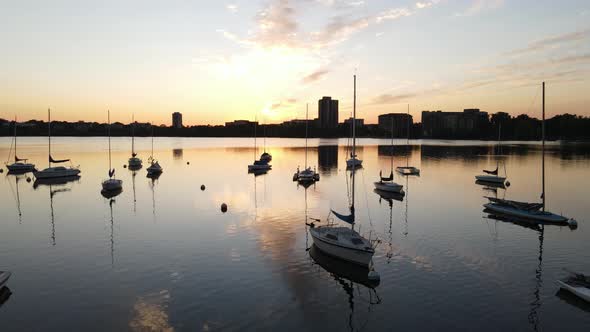 aerial view of boats at the lake during sunset, golden hour in minneapolis, minnesota during summer alt