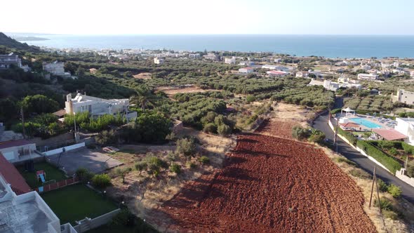Aerial Nature Greek Landscape with Sea Mountain Olive Trees and Houses in Crete alt