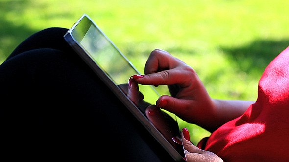 Tablet In The Park