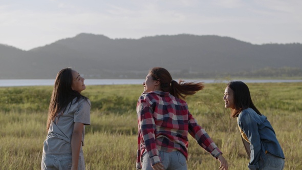 Teenage females having fun together a summer traveling.