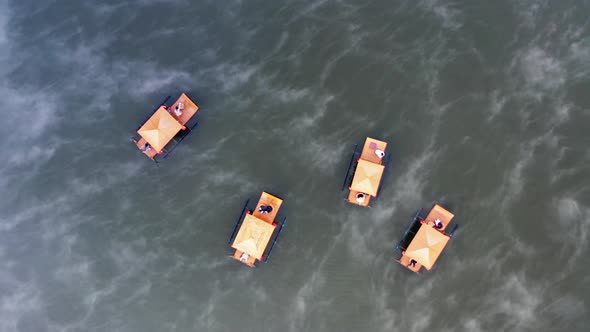 Aerial View of Sunrise with Fog Over Ban Rak Thai Chinese Village Near a Lake in Mae Hong Son alt