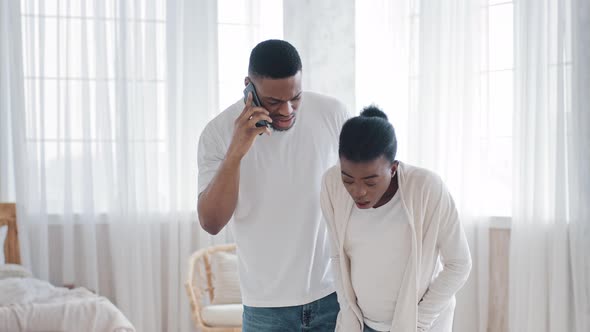 African Scared Suffering Pregnant Woman Feeling Contractions at Home Holding Belly Feel Pain Ache alt