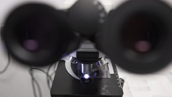 Closeup of a Microscope in the Laboratory