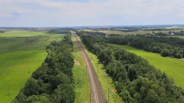 Railroad Through green grassed countryside, Aerial