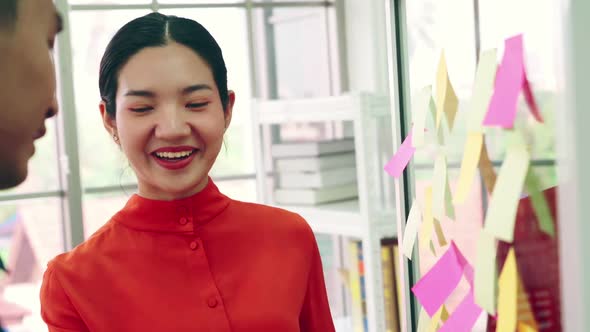 Business People Work on Project Planning Board alt