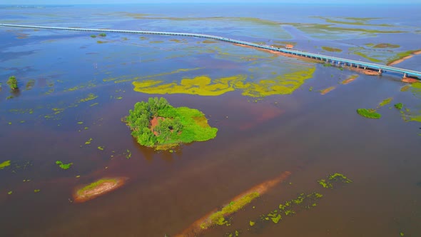 Aerial view over large wetlands in Thale Noi, Phatthalung, Thailand. 4K drone alt