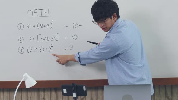 Teachers are teaching through laptops or broadcasting live in the classroom. alt