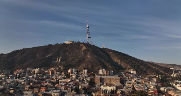 Aerial view of center of Tbilisi under Mtatsminda mountain. Georgia 2022 alt